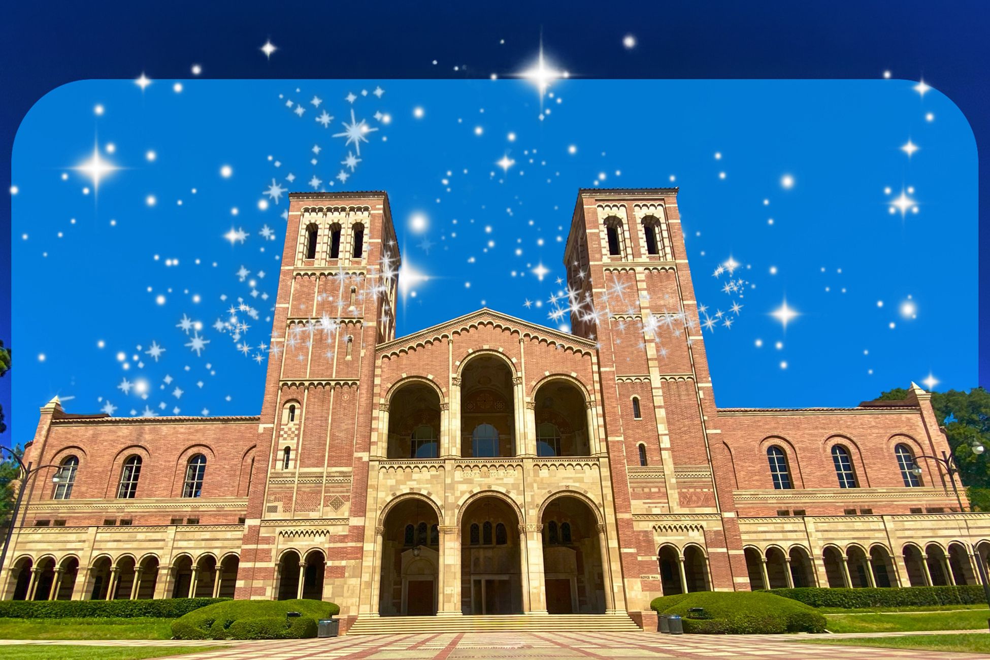 Royce Hall, a spacious brick building adorned with multiple windows, set against a backdrop of a star-filled sky