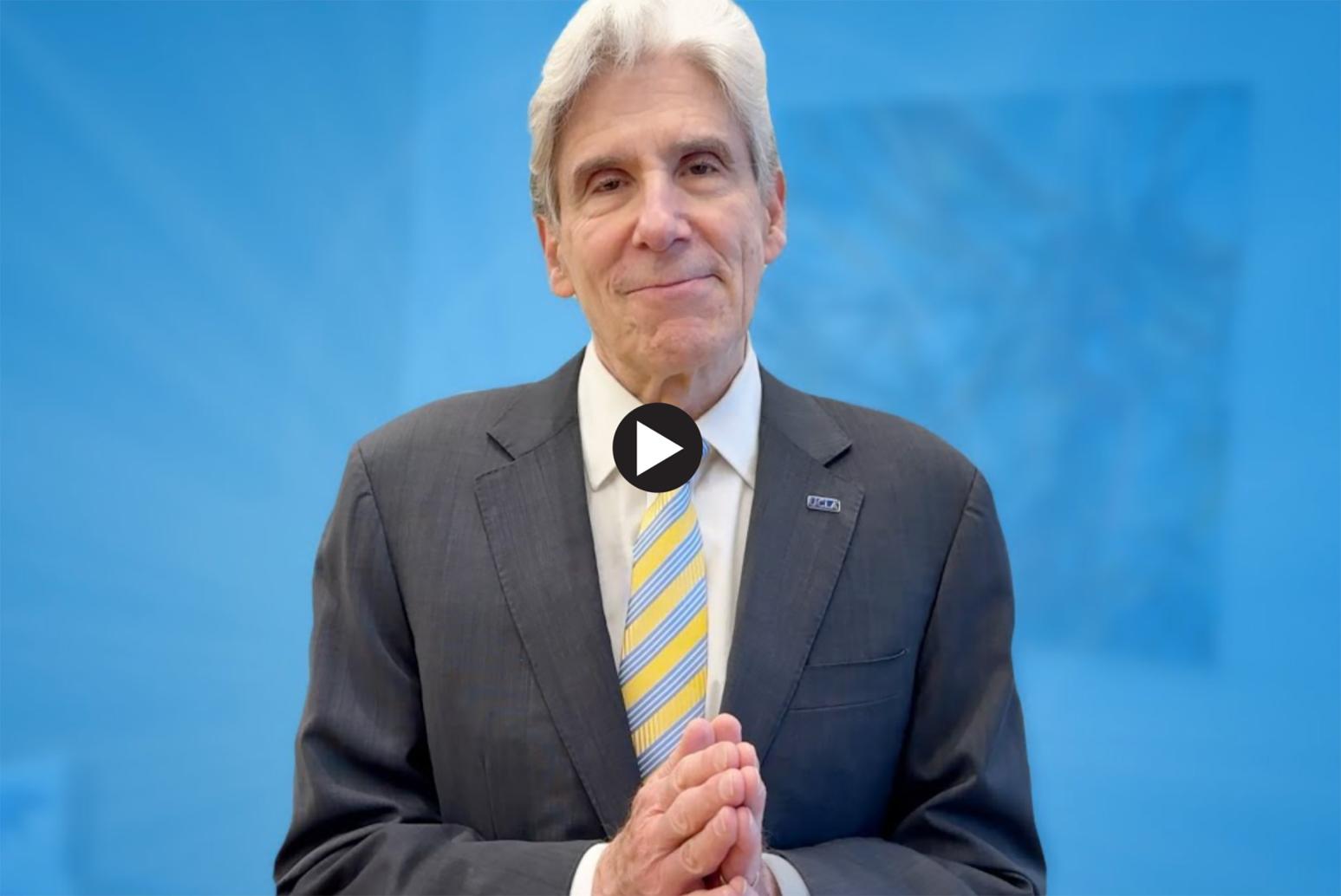 Head-and-shoulders photo of Chancellor Julio Frenk in blue-and-gold tie and gray suit